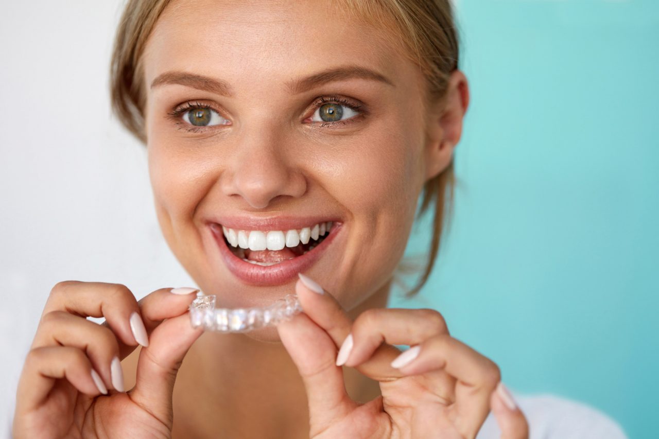 https://www.haltonvillagedental.ca/wp-content/uploads/2020/10/How-to-Use-Teeth-Whitening-Trays-1280x853.jpg