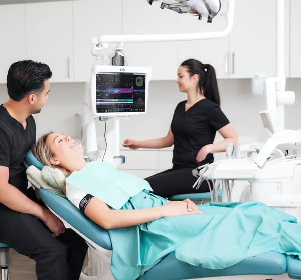 Sedation dentistry at Halton Village Dental, patient monitored by two clinicians